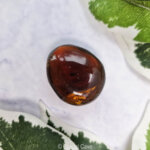 Blauwe sumatra amber steen - Crystal Cave