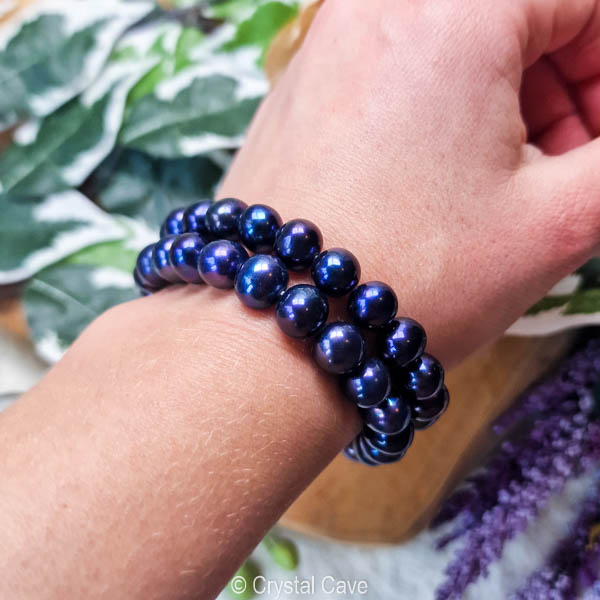 Stunning black geode/Dalmatian beads accented with gold order leaf cuff